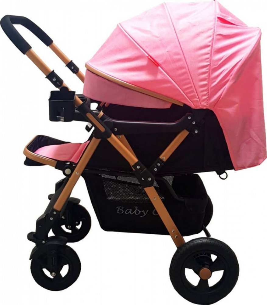 Baby Care Carucior pentru copii PRO 511 Roz Cadru aluminiu Maner reversibil Spatar reglabil in 5 trepte Amortizoare Frana picior Pliabil