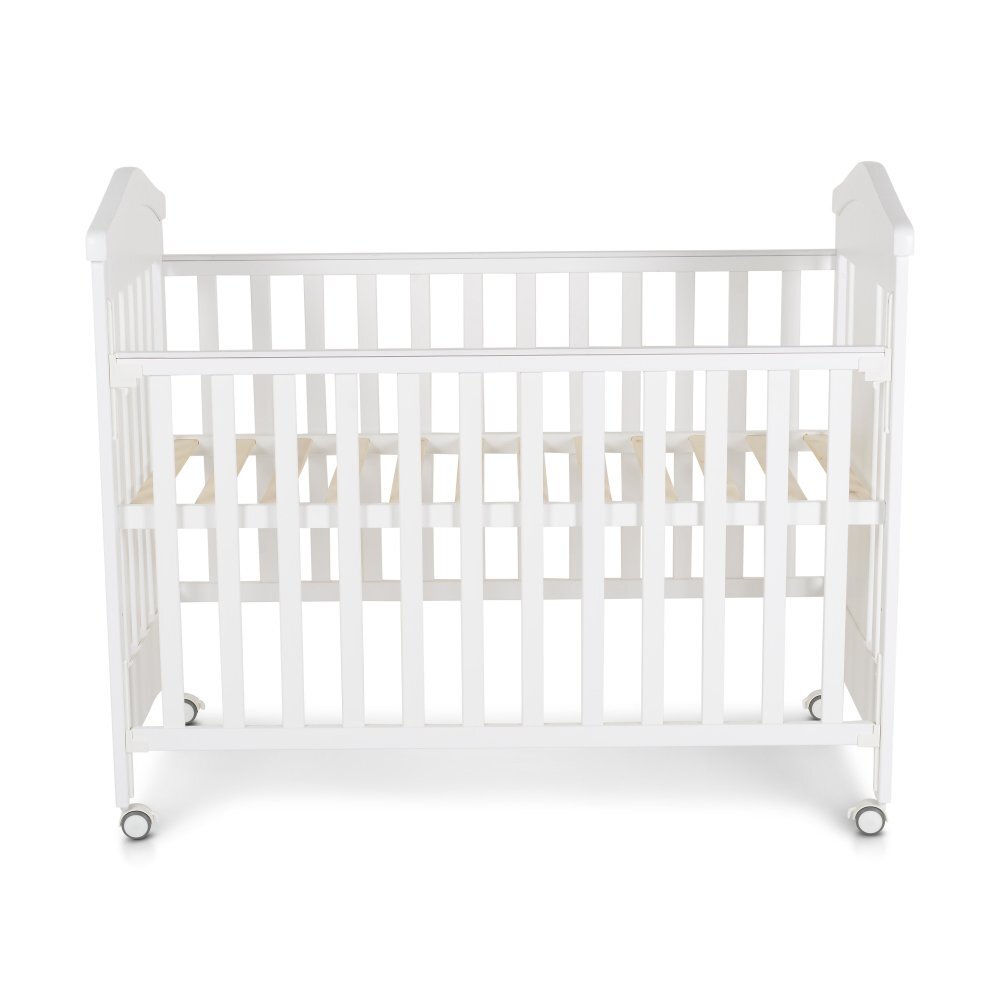 CANGAROO Patut din lemn pentru copii Wing Alb Multifunctional cu Inaltime somiera reglabila pe 3 niveleLaterala culisanta Roti cu sistem blocareMargine din silicon pentru protectie dintisoriVopsea non toxica
