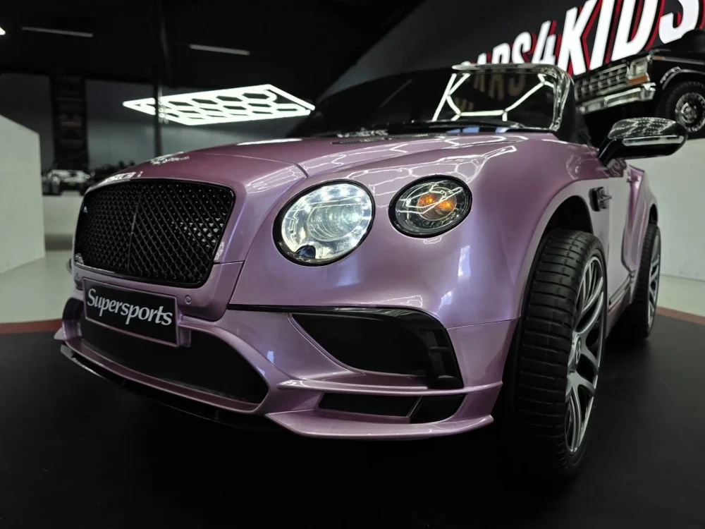 Cars4Kids Masinuta electrica pentru copii Bentley Continental Roz Metalizat 12V telecomanda 2.4G sa piele neagra usi functionale