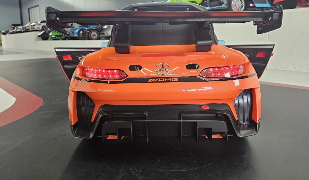 Cars4Kids Masinuta electrica pentru copii Mercedes GT3 AMG Portocaliu 12V licenta oficiala telecomanda 2.4G scaun piele deschidere usi