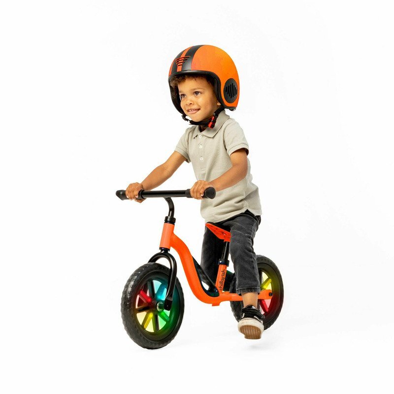 Chillafish Bicicleta copii fara pedale Charlie Glow Orange 10 inch roti din spuma Eva scaun reglabil de la 28-37 cm ghidon ajutabil de la 476-504 cm cadru usor varsta recomandata 18-48 luni spite stralucitoare