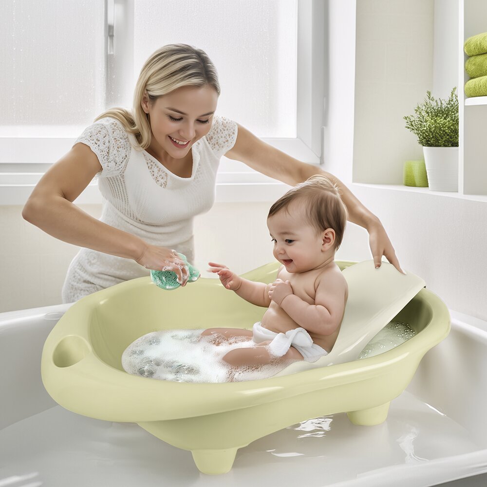 Dolu Nuve Cadita cu suport anatomic Hippo verde eco designul usor si compact cu dop de scurgere 6 luni+