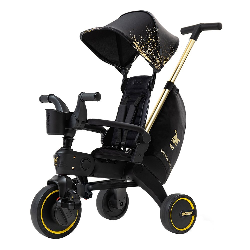 Doona Tricicleta pentru copii Liki Trike Gold Editie Limitata ultrapliabila maner parental ajustabil spatar reglabil in multiple pozitii roti Eva si cadru din aluminiu varsta 10 luni+