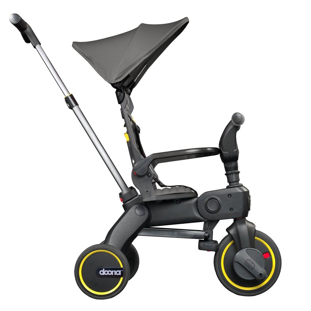 Doona Tricicleta pentru copii Liki Trike S1 Grey Hound ultrapliabila in 3 secunde capotina cu protectie UV maner cu control al directiei spatar reglabil multiple pozitii roti din cauciuc Eva si cadru din aluminiu