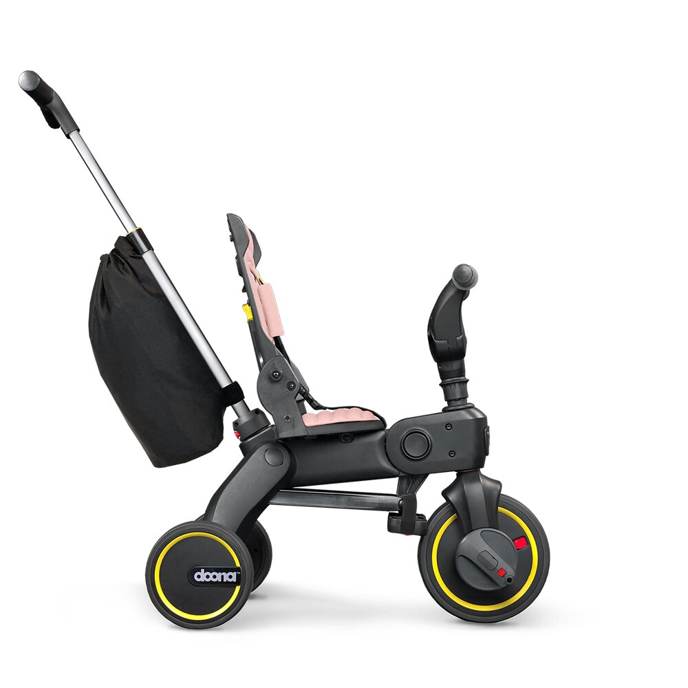 Doona Tricicleta pentru copii Liki Trike S3 Bush Pink ultrapliabila spatar reglabil in multiple pozitii ultracompacta frana cadru din aluminiu