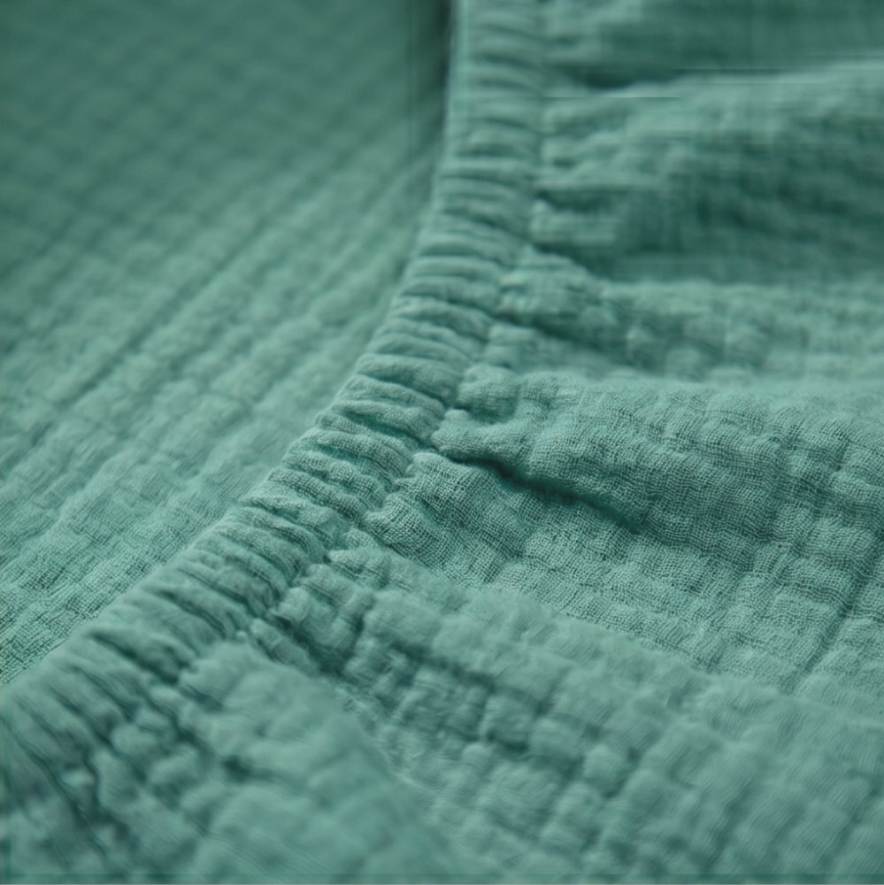 Kerstin Cearceaf cu banda elastica pentru landoucarucior si cosulet copii Premium Muslin Emerald realizat din muselina bumbac 100 dimensiune 80 x 38 cm