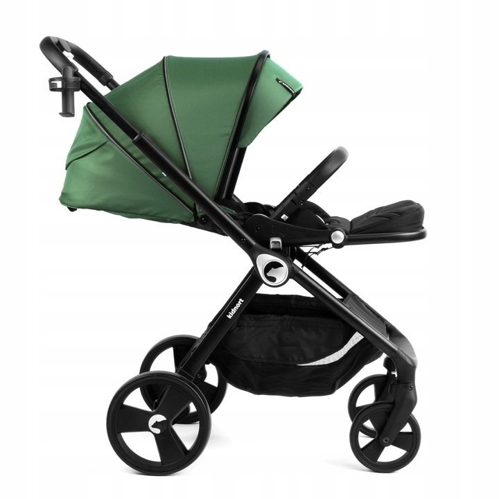 Kidnort Carucior reversibil pentru copii cu pliere compacta spatar si viziera reglabile Isbjorn Green pana la 22 kg roti cu suspensii accesorii incluse suport pentru pahar