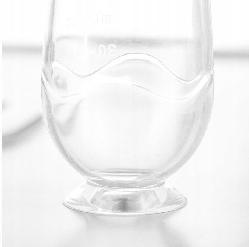 Kidnort Lingurita pentru copii din silicon cu rezervor gradat 90 ml si ventuza de prindere Retter Sommar Yellow
