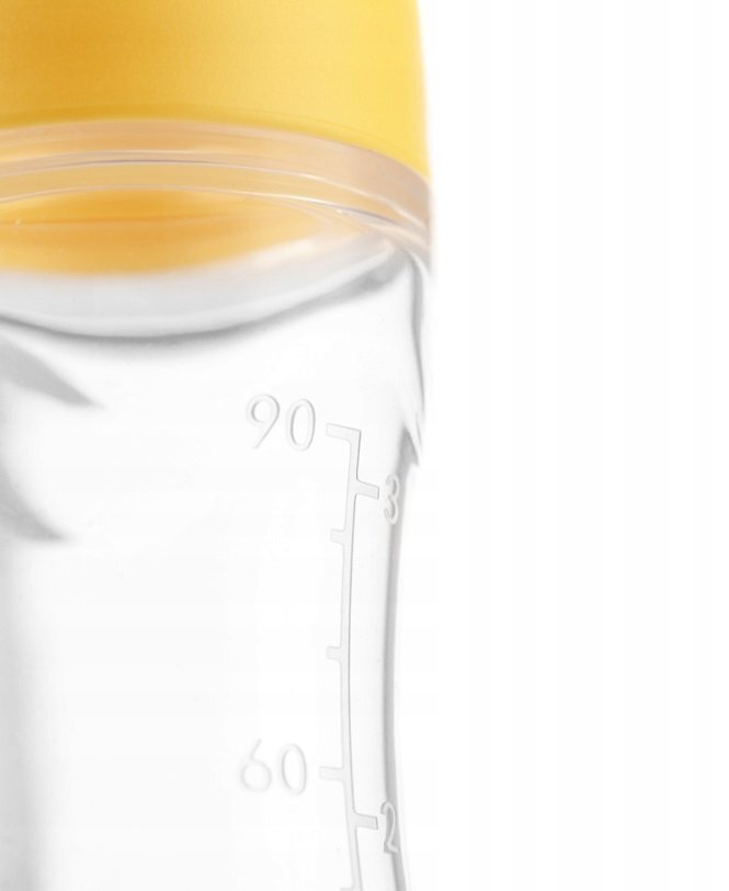 Kidnort Lingurita pentru copii din silicon cu rezervor gradat 90 ml si ventuza de prindere Retter Sommar Yellow