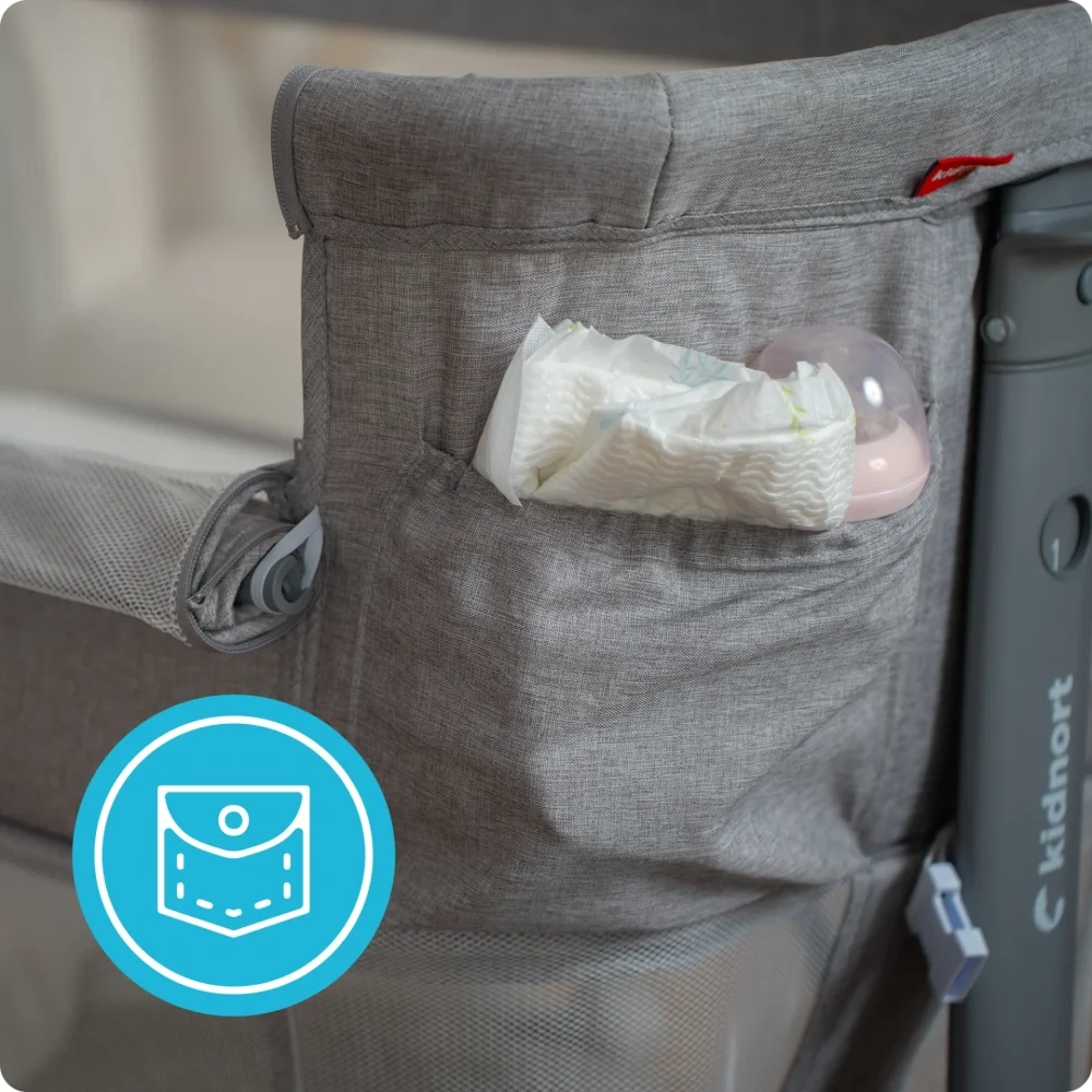 Kidnort Patut multifunctonal tip co-sleeper si tarc de joaca pentru copii Snackskal II Grey structura din otel cu inaltime ajustabila roti cu frane buzunar lateral sistem de balansare incorporat accesorii incluse
