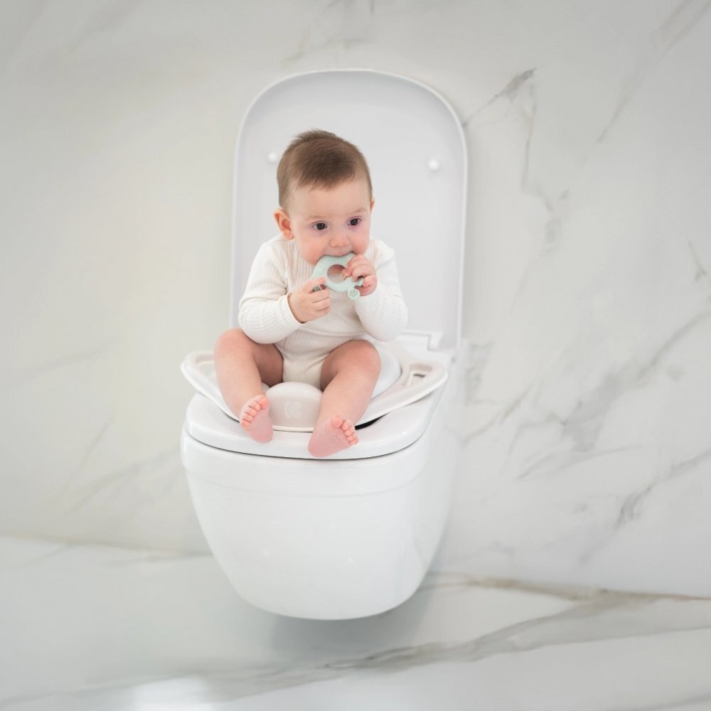 KikkaBoo Reductor pentru toaleta copii Soft Hippo Pinkcu manere ergonomicecolac moale din spuma cu suprafata impermeabila
