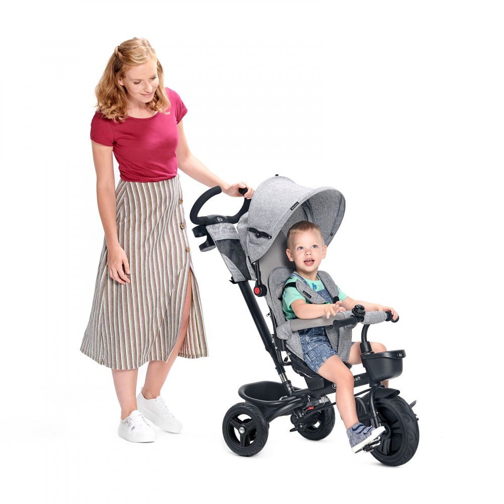 KINDERKRAFT Tricicleta pentru copii Aveo Light Grey de la 9 luni cu sezut rotativ suport pentru picioare maner cu control al directiei gentuta si cos pentru accesorii