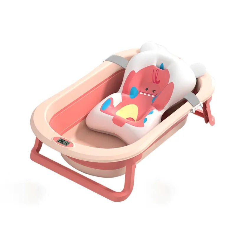 Little Mom Cadita bebelusi pliabila Dino Pink include o perna de siguranta detasabila termometru cu display digital protectie anti-alunecare 87x51x23 cm