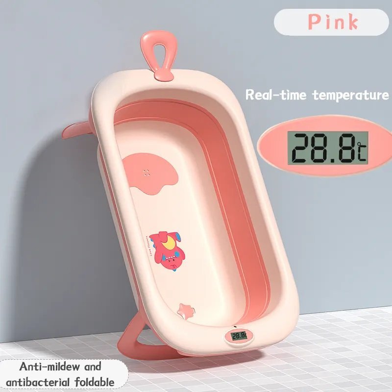 Little Mom Cadita bebelusi pliabila Dino Pink include o perna de siguranta detasabila termometru cu display digital protectie anti-alunecare 87x51x23 cm