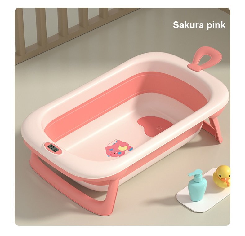 Little Mom Cadita bebelusi pliabila Dino Pink include o perna de siguranta detasabila termometru cu display digital protectie anti-alunecare 87x51x23 cm