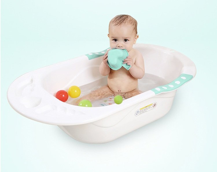 Little Mom Cadita pentru copii Sunny Green echipata cu manere antiderapante Dop de scurgere dimensiune 88 x 51 x 22 cm si Reductor detasabil ergonomic cu fixare in ventuze inclus