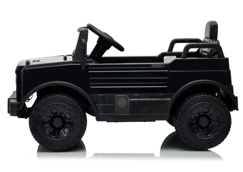 MERCEDES-BENZ Masinuta electrica pentru copii Mercedes Unimog HM7588 6V4Ah Black cu telecomanda 2.4G roti EVA 2 motoare 45W bluetooth port USB slot Micro SD MP3 si faruri LED 90 x 53 x 50 cm