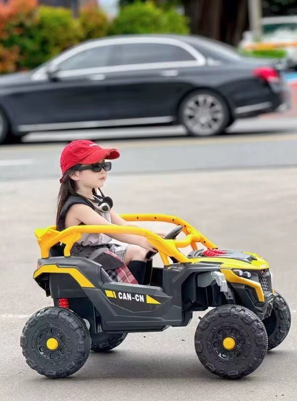 Nichiduta Masinuta electrica de teren pentru copii Can CN UTV Drive Yellow 12V cu telecomanda 2.4G2 motoare 38Wlumini LEDsuspensii spateroti late rezistentemargine de siguranta rabatabilasunete si muzicafunctie swing