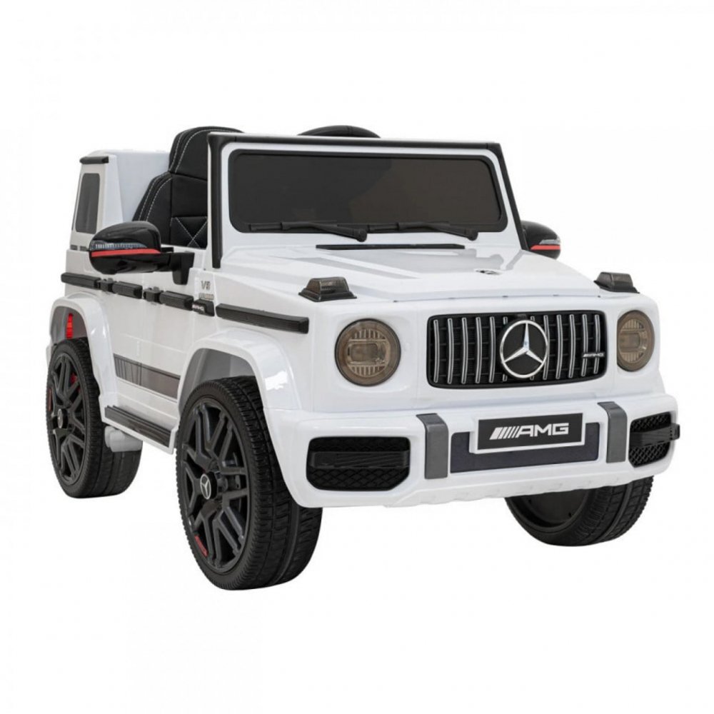 Novokids Masinuta electrica pentru copii Mercedes G63 AMG Alb roti din cauciuc Eva melodii si USB usi cu deschidere 12V 2 viteze lungime 120 cm 2 motoare de 25 W