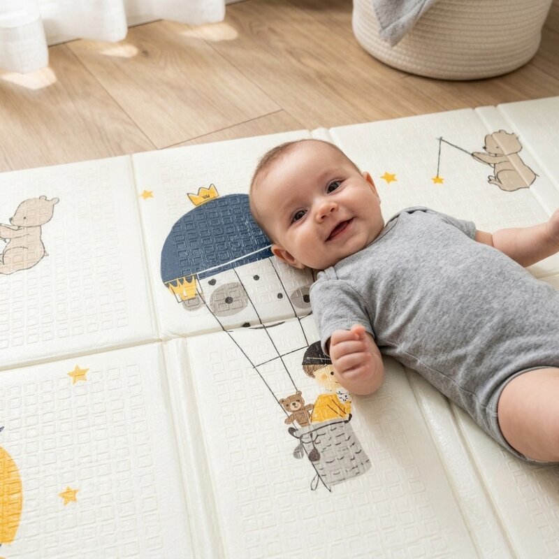 Petite&Mars Covoras educativ PetiteMars Campy L din spuma XPE non-toxica cu doua fete suprafata antiderapanta 130x200 cm pliabil compact 40x32x21 cm model baloane si forme geometrice