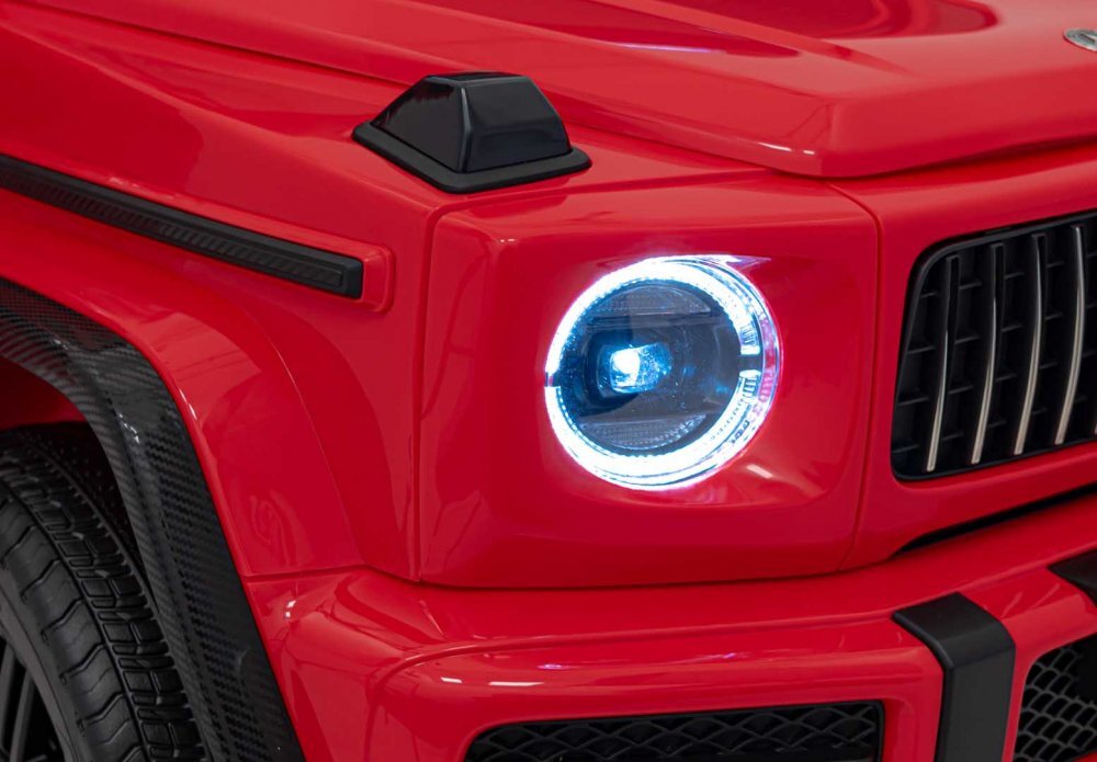 Ramiz Masinuta electrica 4x4 pentru copii Mercedes Benz G63 AMG XXL motor 4 x 200W baterie 24V7Ah panou audio buton de pornire slow start dimenesiune 159 x 97 x 81 cm