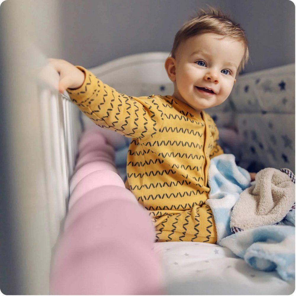 Ricokids Protectie laterala impletita pentru patut cu umplutura antialergica 3metri din plus Roz deschis