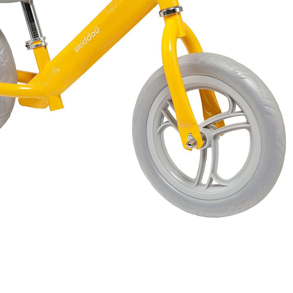 Skiddou Bicicleta fara pedale Nils Galben 12 inch cadru din aluminiu ultra-usoara scaun reglabil de la 33 la 39 cm roti spuma EVA+PU de la 2 ani include sonerie pentru bicicleta volan cu blocare prin rotire