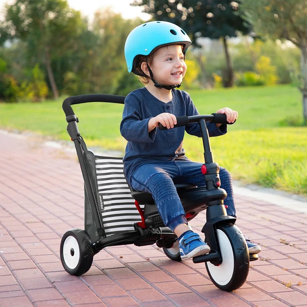 SMART TRIKE Tricicleta pentru copii STR5 Elephant 7 in 1 pliabila dotata cu frana scaun rabatabil sistem patentat Touch Steering si cu certificare de carucior varsta 9 luni+