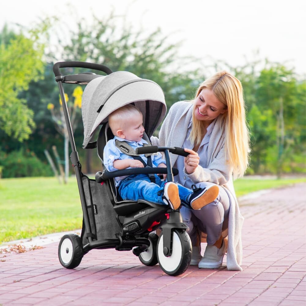 SMART TRIKE Tricicleta pentru copii STR5 Gri 7 in 1 ultrapliabila dotata cu frana scaun rabatabil de la 6 luni sistem patentat cu tehnologie Touch Steering