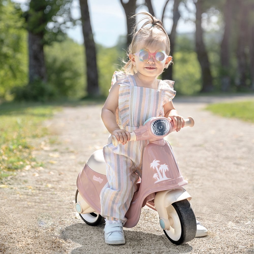 SMOBY Scuter pentru copii fara pedale Scooter Ride-On roz dotat cu cheie ce imita pornirea reala a scuterului recomandat copiilor incepand de la 15 ani spatiu de depozitare sub sezut