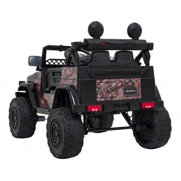Toyota Masinuta electrica pentru copii FJ Cruiser 4x4 negru 90W cu telecomanda sunete suspensii lumini panou audio scaun piele si roti din spuma Eva