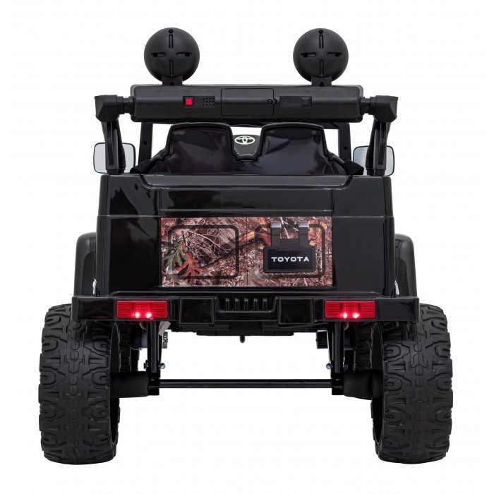 Toyota Masinuta electrica pentru copii FJ Cruiser 4x4 negru 90W cu telecomanda sunete suspensii lumini panou audio scaun piele si roti din spuma Eva