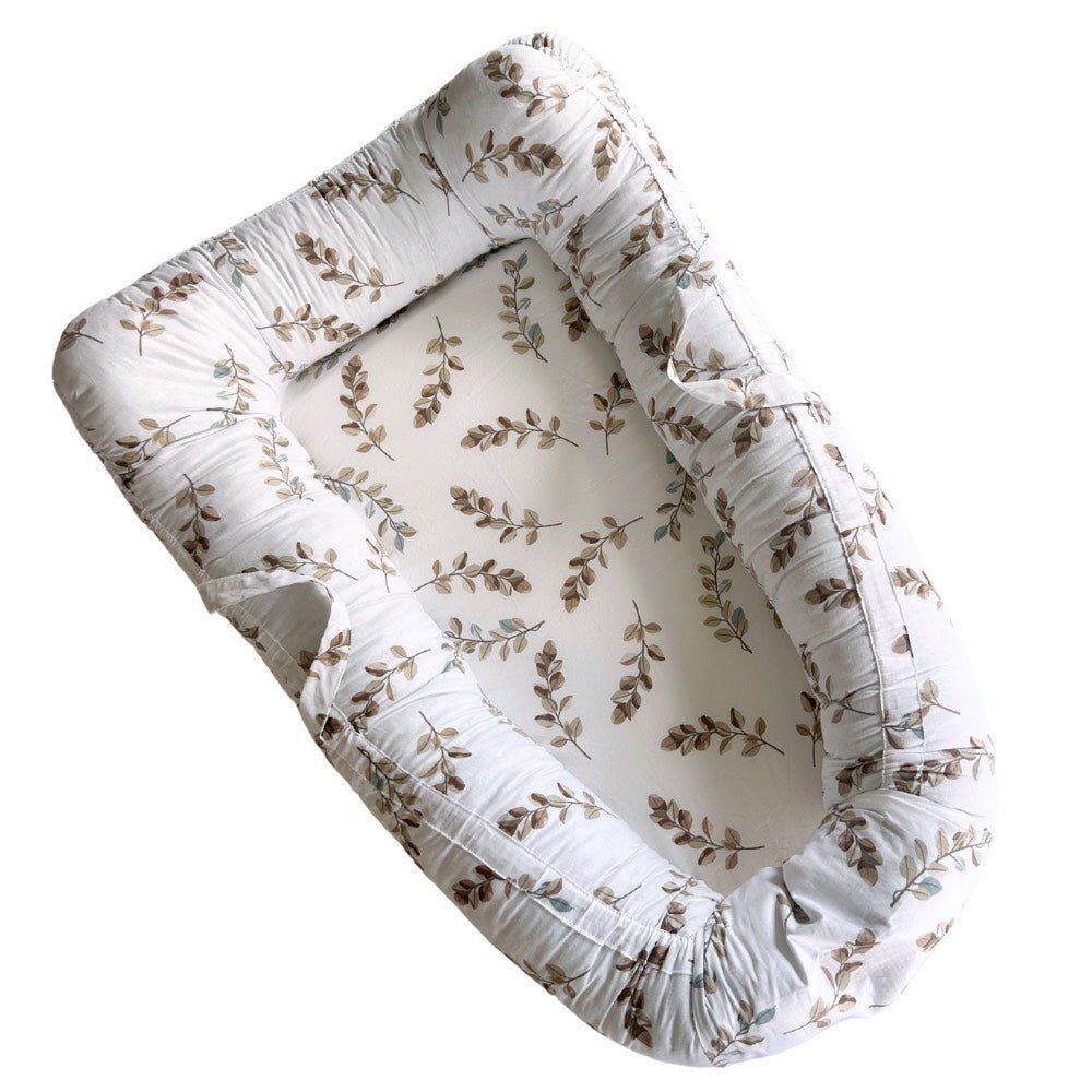 TWINDECO Baby Nest cu manere din bumbac organic Alb cu frunze maro